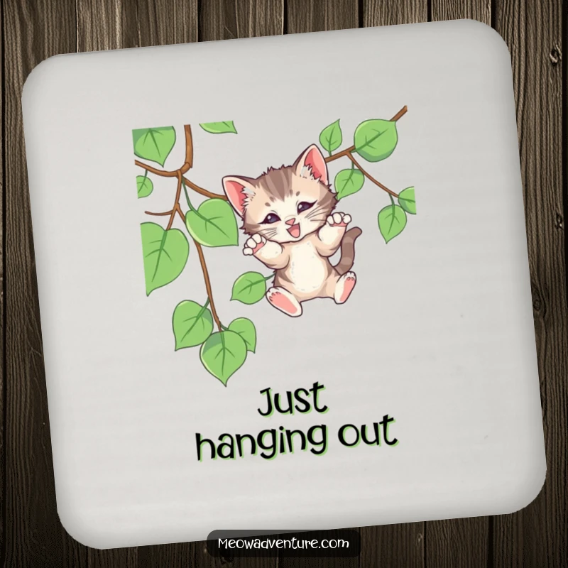 Funny drink coaster showcasing a kitten playfully pouncing on a vine, protecting tables with feline-inspired humor, a cute gift.