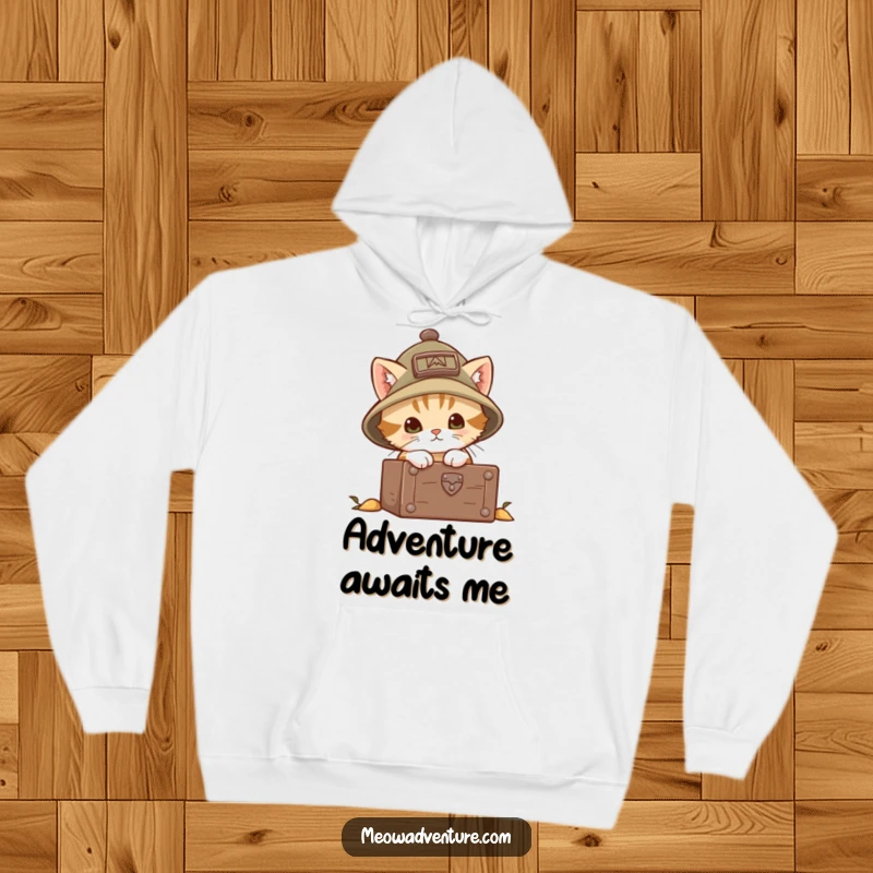 Funny explorer kitten hoodie featuring a brave cat in an explorer hat, peeking into a mysterious chest. Soft and warm for journeys.