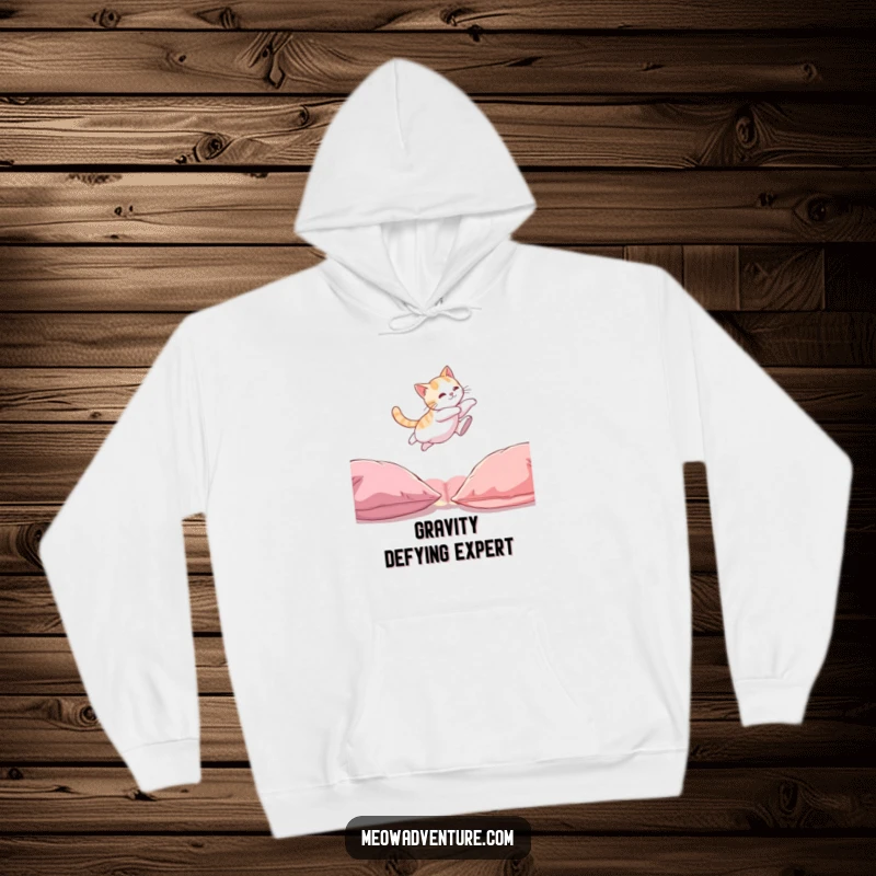 Funny Cat Hoodie: A dynamic illustration of a cat mid-air, leaping between couch cushions, conveying playful energy.