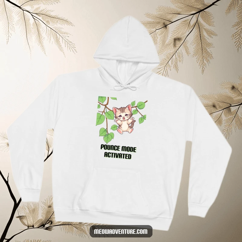 Funny hoodie depicting a cute kitten playfully pouncing on a dangling vine, full of energy and humor, a cozy gift.