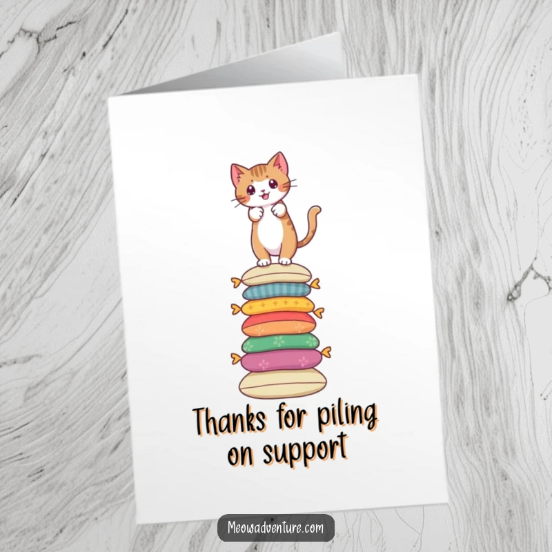 Funny Free Printable Thank You Card: A brave cat scales a stack of cushions, conveying thanks with a daring spirit and a smile.