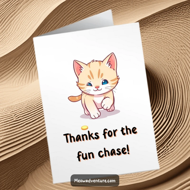 Funny Free Printable Thank You Card: A cute kitten energetically pursuing a red laser dot, expressing thanks with playful antics.
