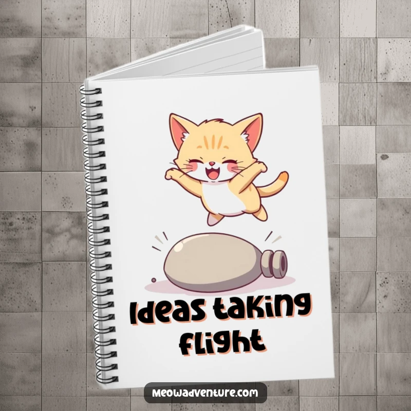 Funny kitten notebook, a joyful cat in a graceful leap over a fallen object, inspiring creative writing with humor.