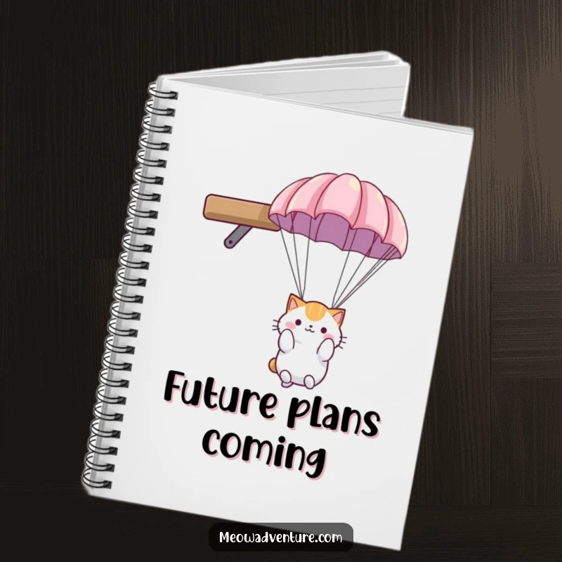 Funny cat notebook: fluffy cat with a small parachute, descending gently from a high shelf, ready to jot down notes.