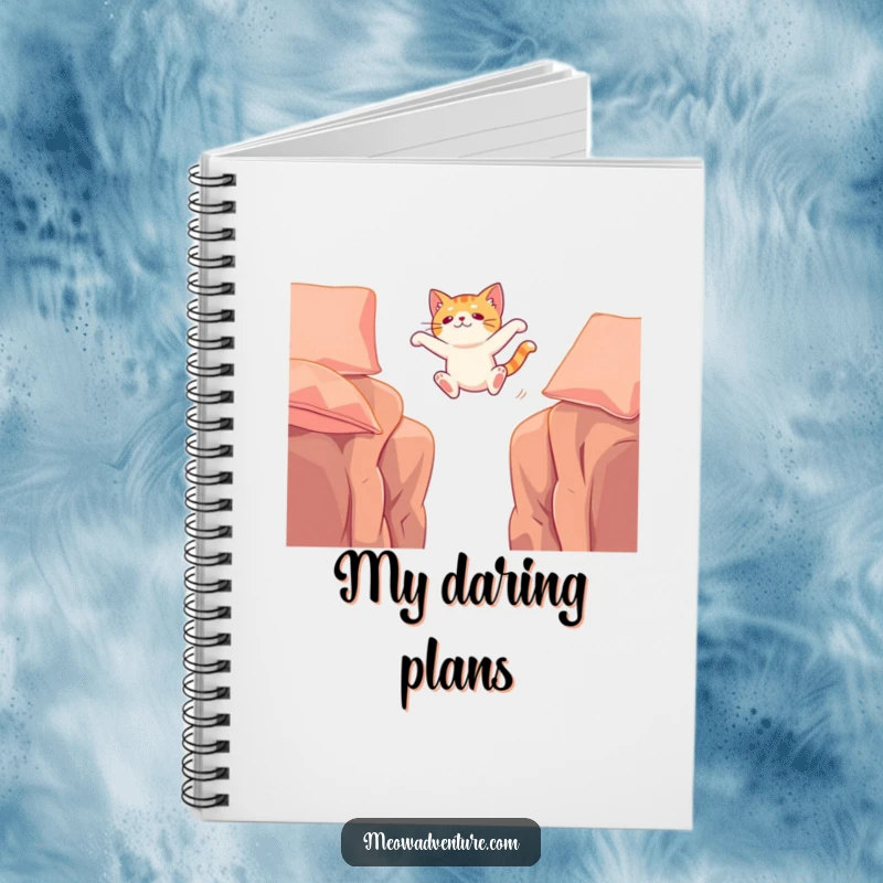 Funny notebook cover showing a cat making a daring leap between cushions, inspiring users to tackle challenges with confidence.