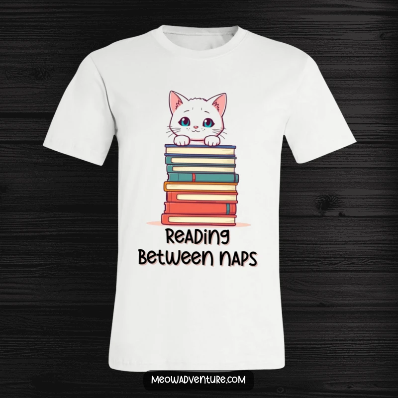 Funny Cat Books T-Shirt showing a curious white cat peeking over a tall stack of books, celebrating reading and cats.