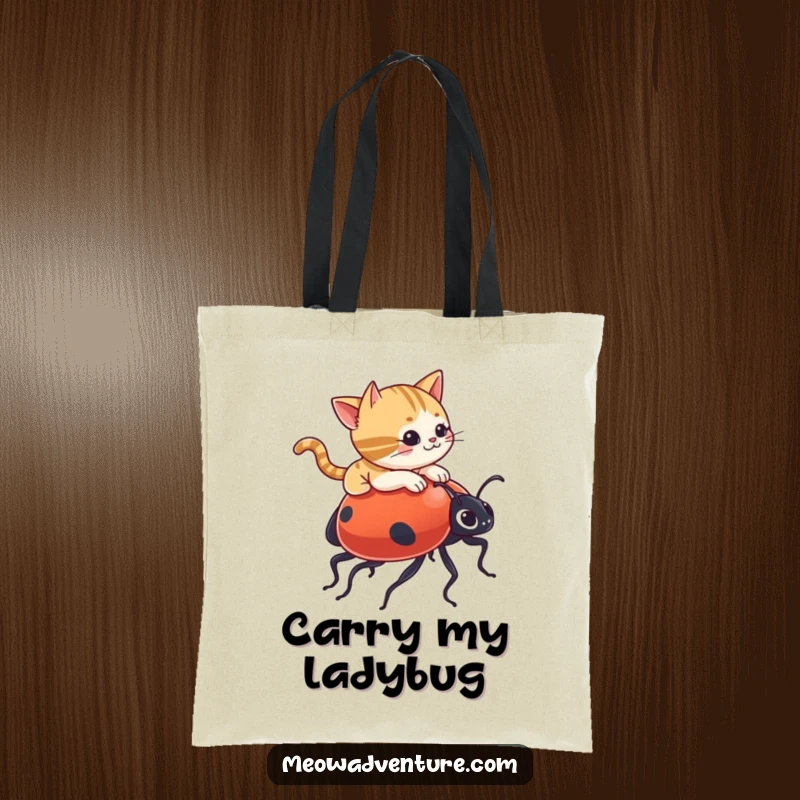 Funny tote bag depicting a mischievous cat riding a giant ladybug, ideal for stylish and humorous everyday use.