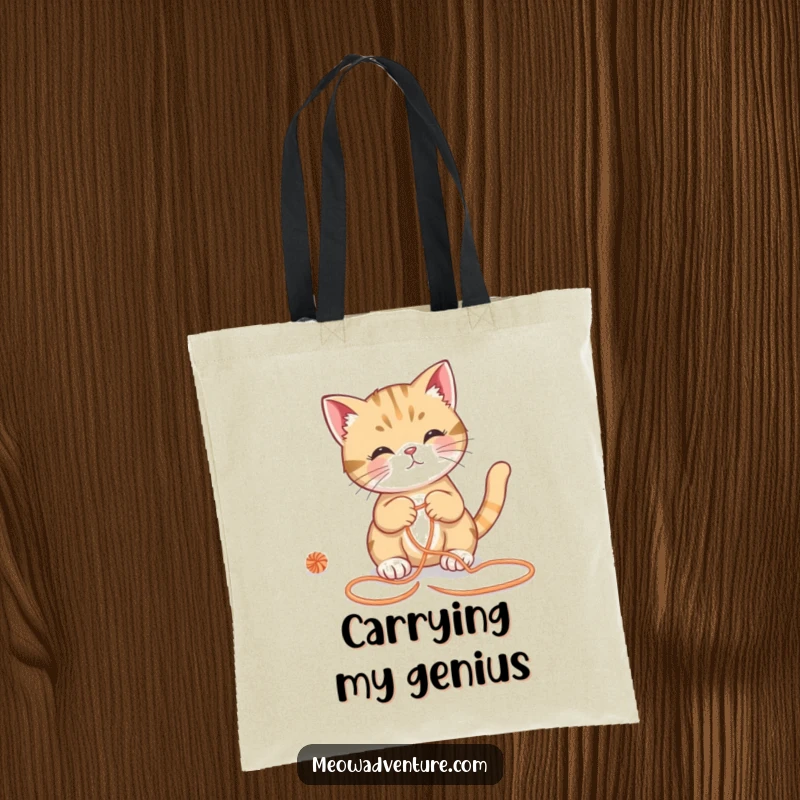 Funny cat tote bag, resourceful feline mastering a yarn maze, stylish and humorous accessory, great funny gift for shoppers.