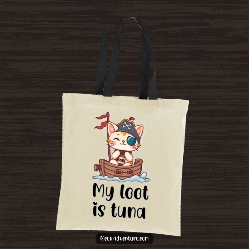 Funny cat pirate sailing a small ship, printed on a durable tote bag, ideal for shopping and travel.