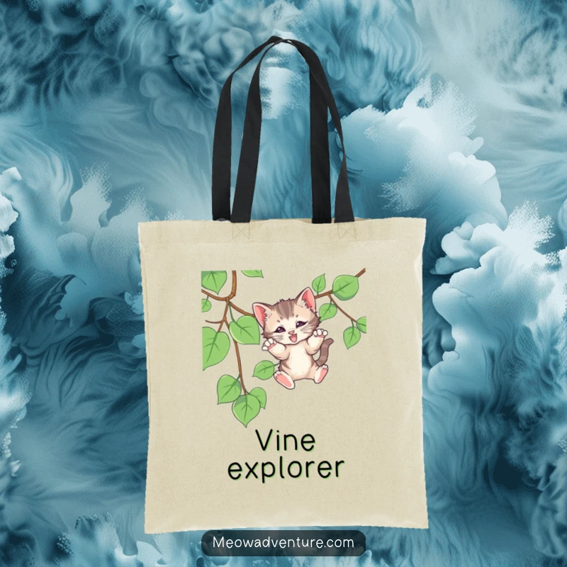 Funny tote bag showcasing a mischievous kitten ready to pounce on a vine, perfect for carrying daily items with humor.